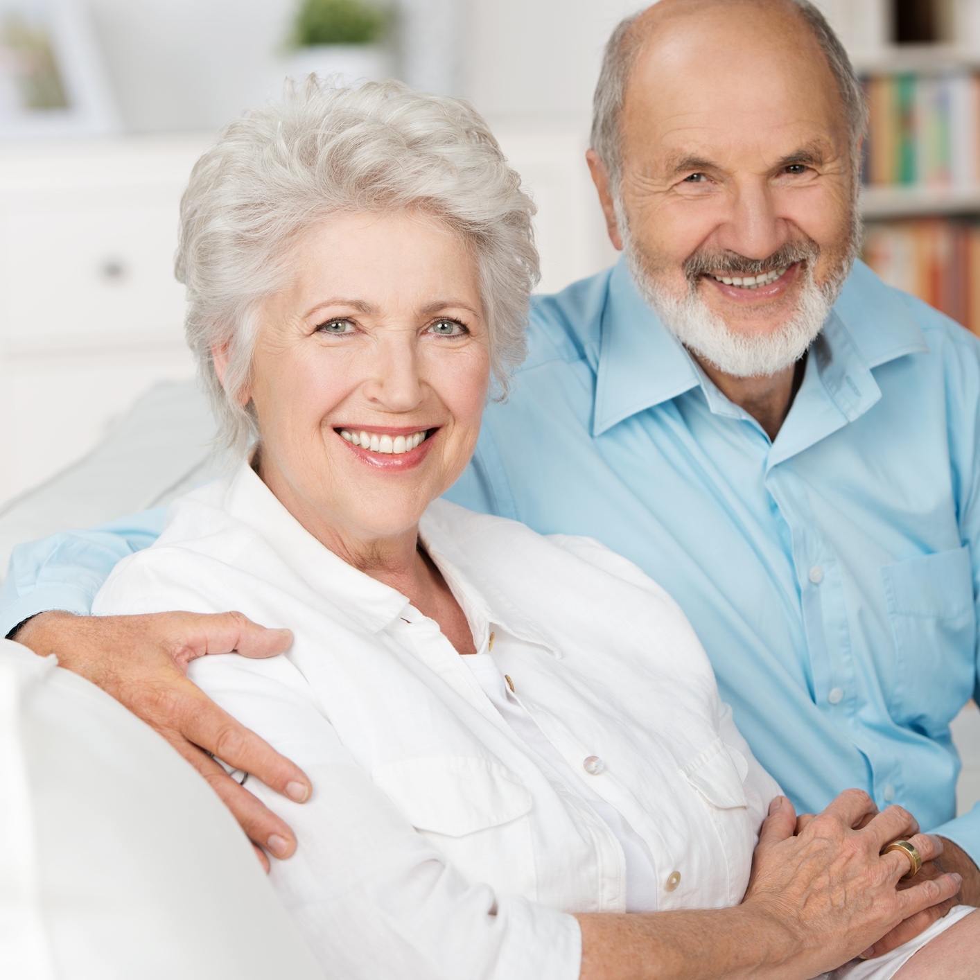 elderly couple smiling
